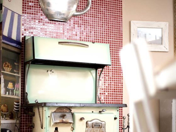 A restored enamel stove in the kitchen.
